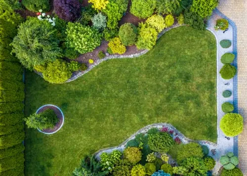 Maintained lawn and planting beds on a Newport County property